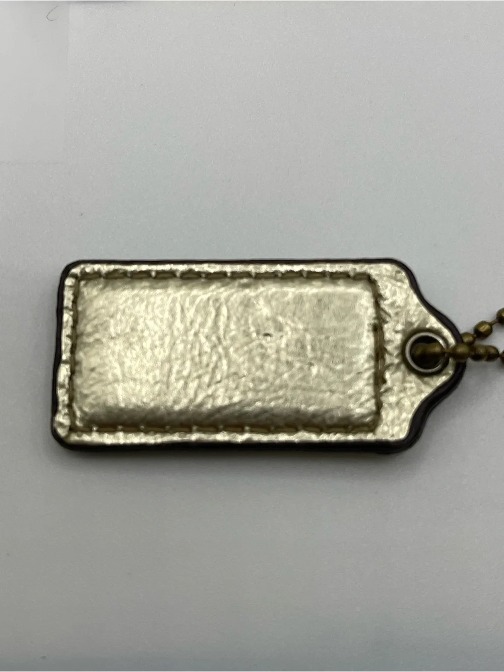 Coach Metallic Gold Leather Hang Tag